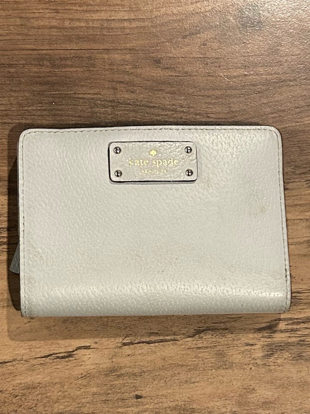 kate spade Pebbled Leather Compact Wallet in Light Gray